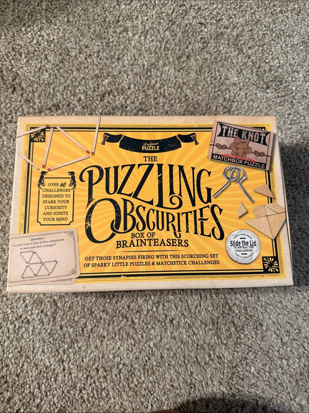 Puzzling Obscurities Box of Brainteasers - Yellow